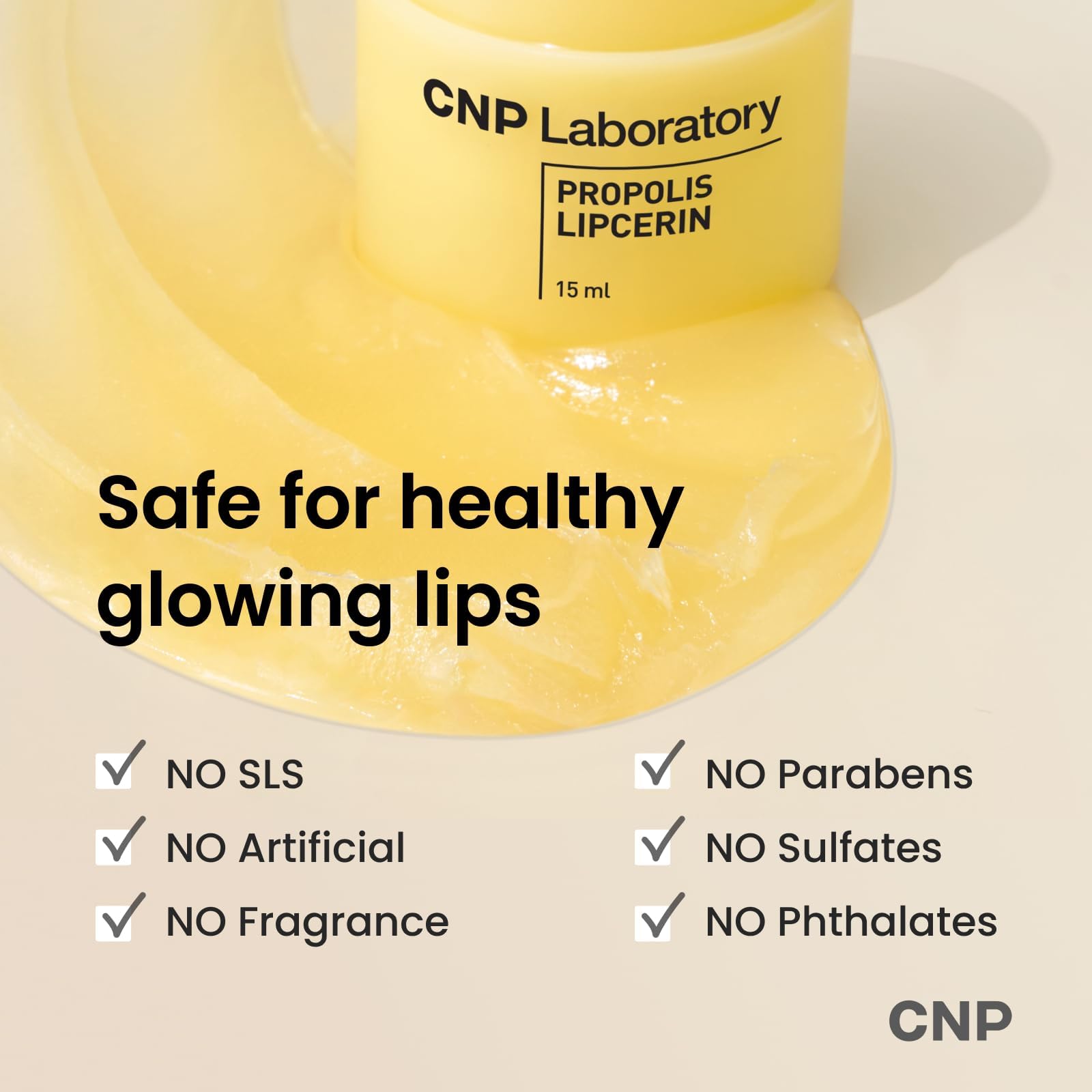 CNP Honey Lip Butter being applied from the dial applicator for easy use
