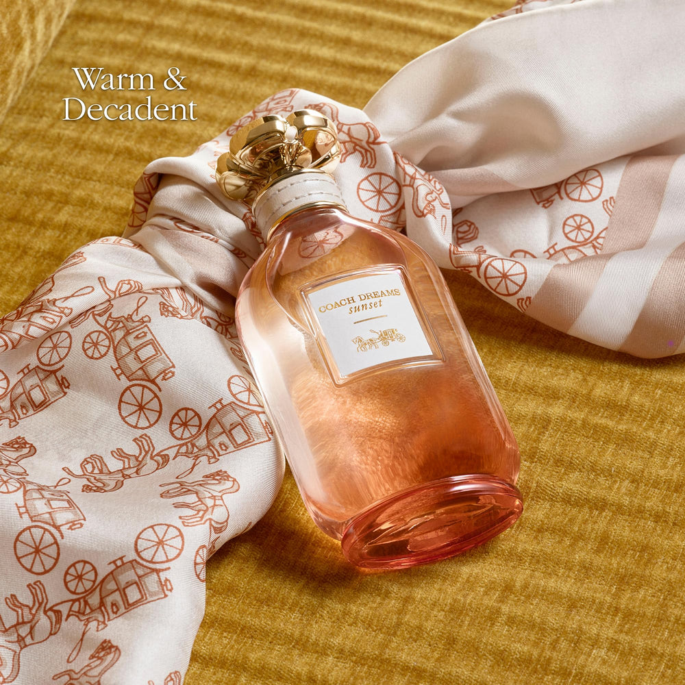 Coach Dreams Sunset pouch with contents organized to protect and transport fragrance