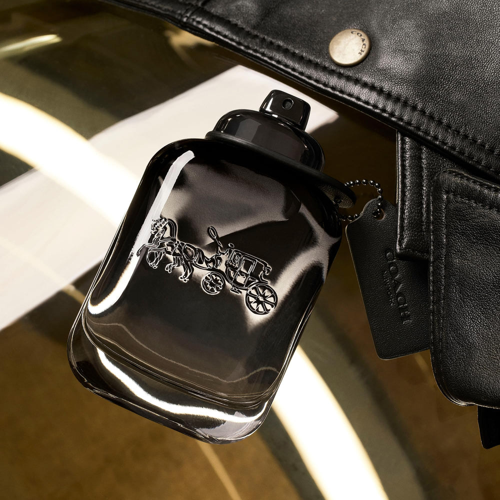 Coach travel spray in bag demonstrates portability for commuters