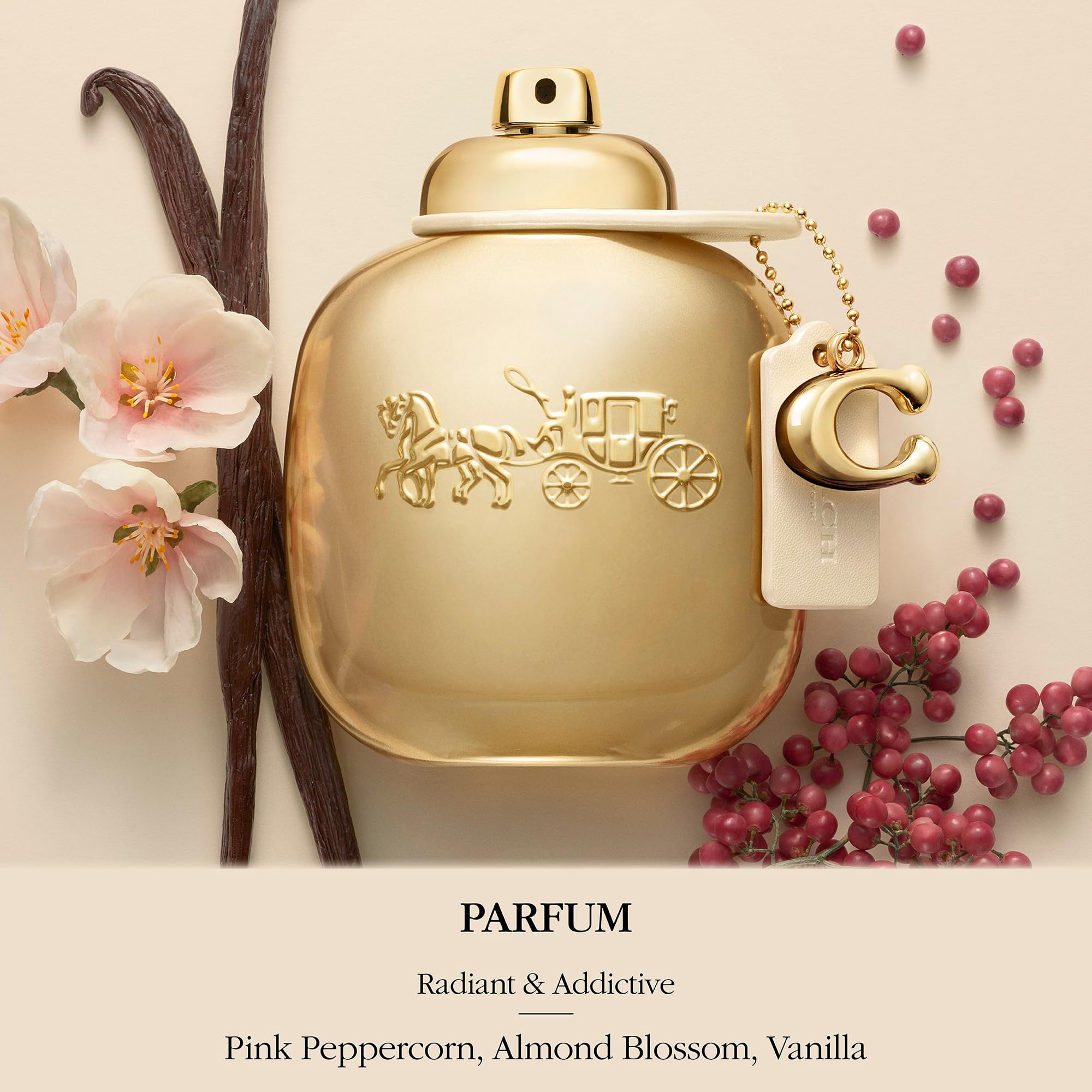 Coach gold nozzle closeup emphasizing fine mist and easy application