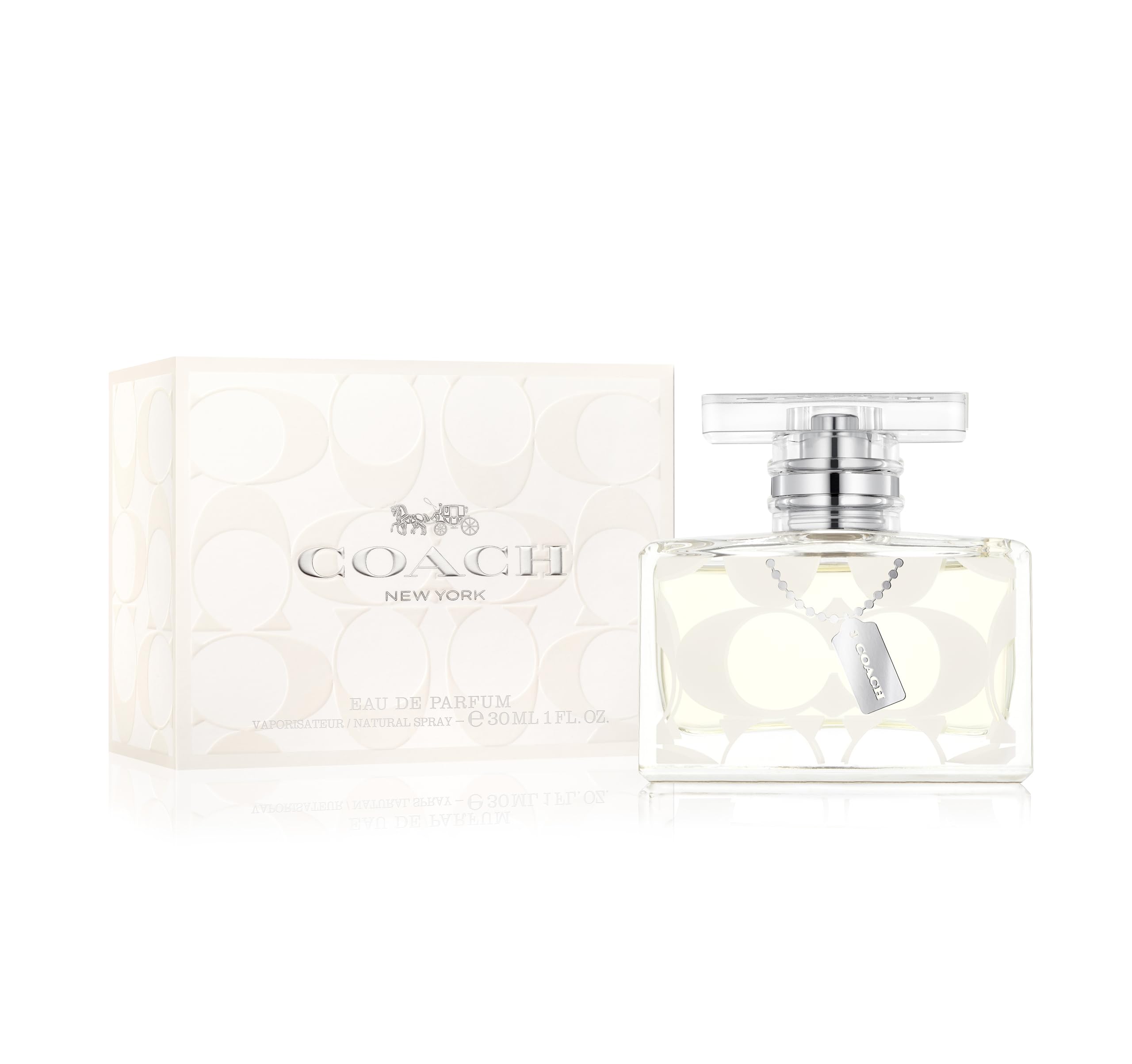 Coach signature bottle in hand demonstrating compact travel-ready convenience