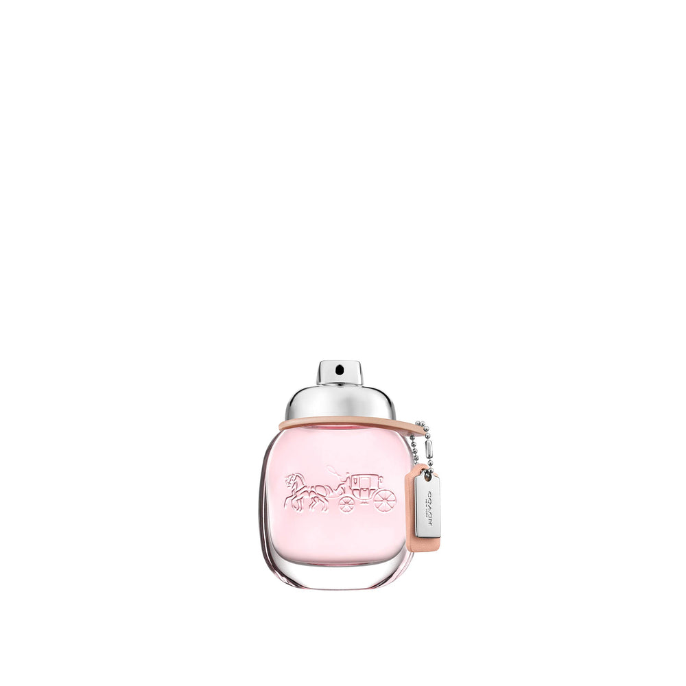 Coach bottle front view showing compact perfume and easy travel benefit