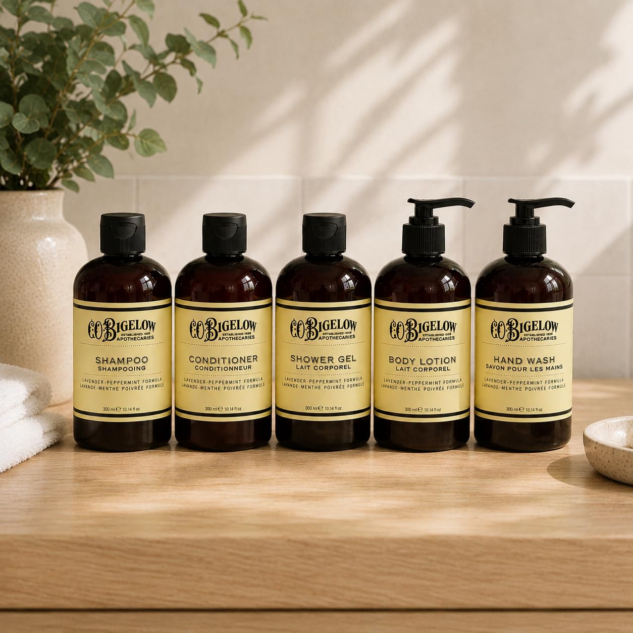 C. O. Bigelow conditioner held in hand to show size and everyday convenience