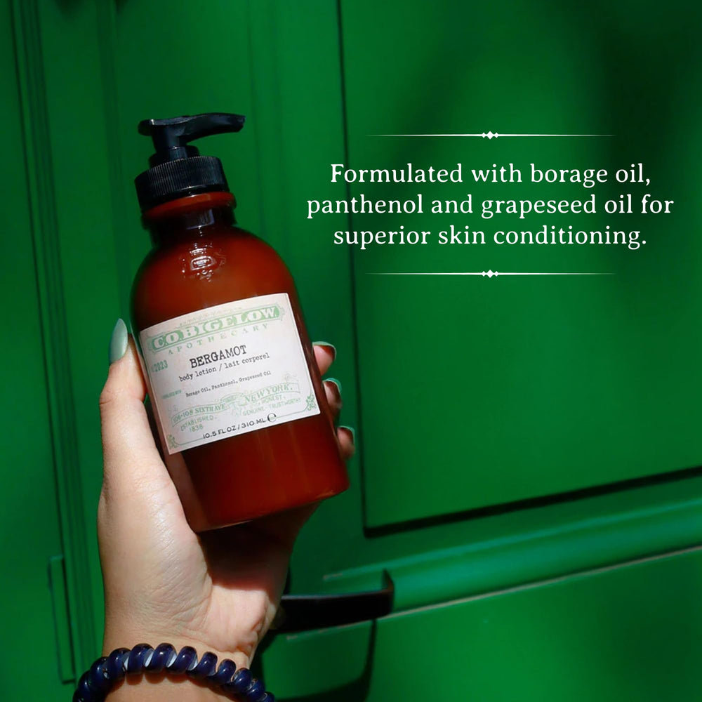 C. O. Bigelow applying lotion to hands to show immediate softening benefit
