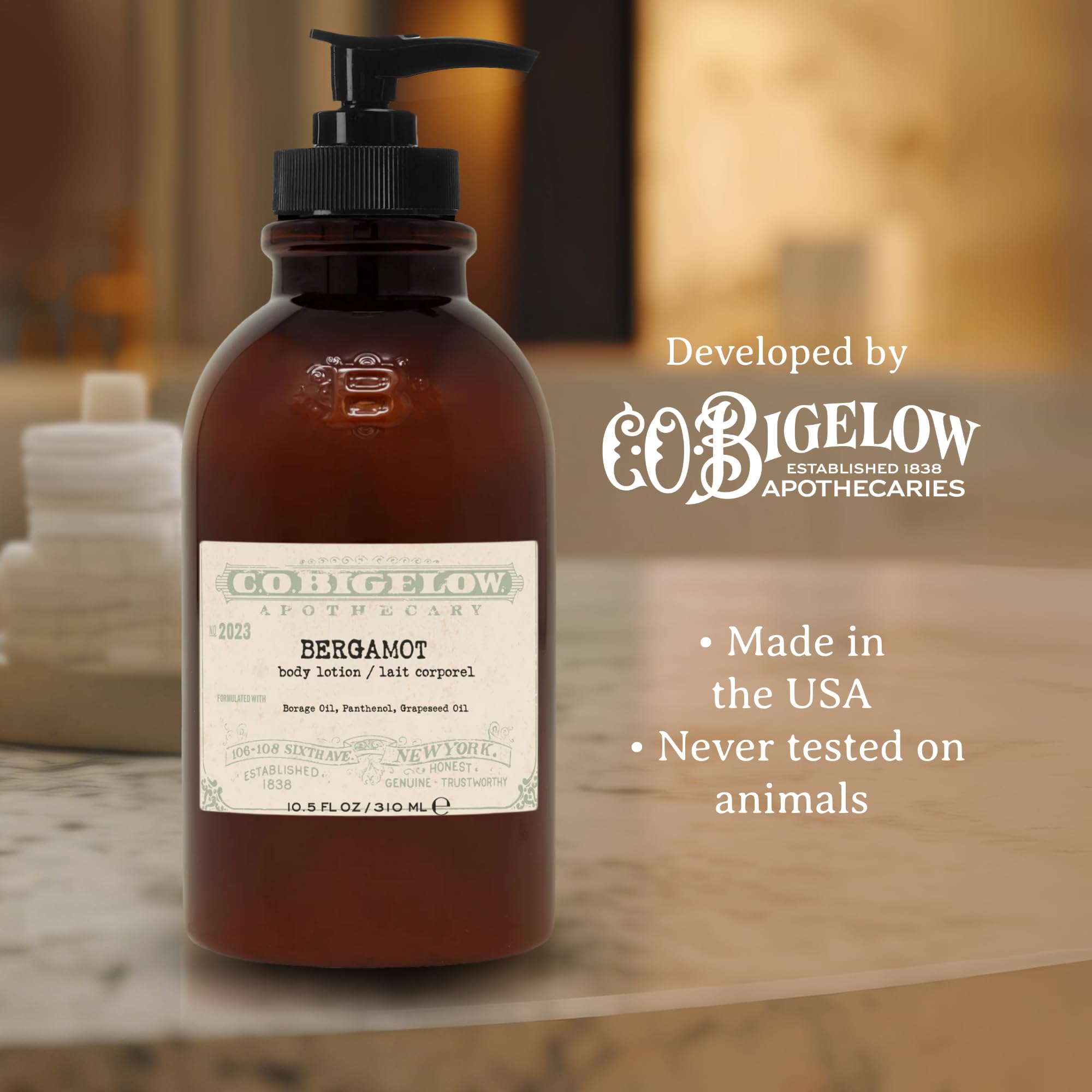 C. O. Bigelow bottle next to a hand for scale and travel-ready convenience