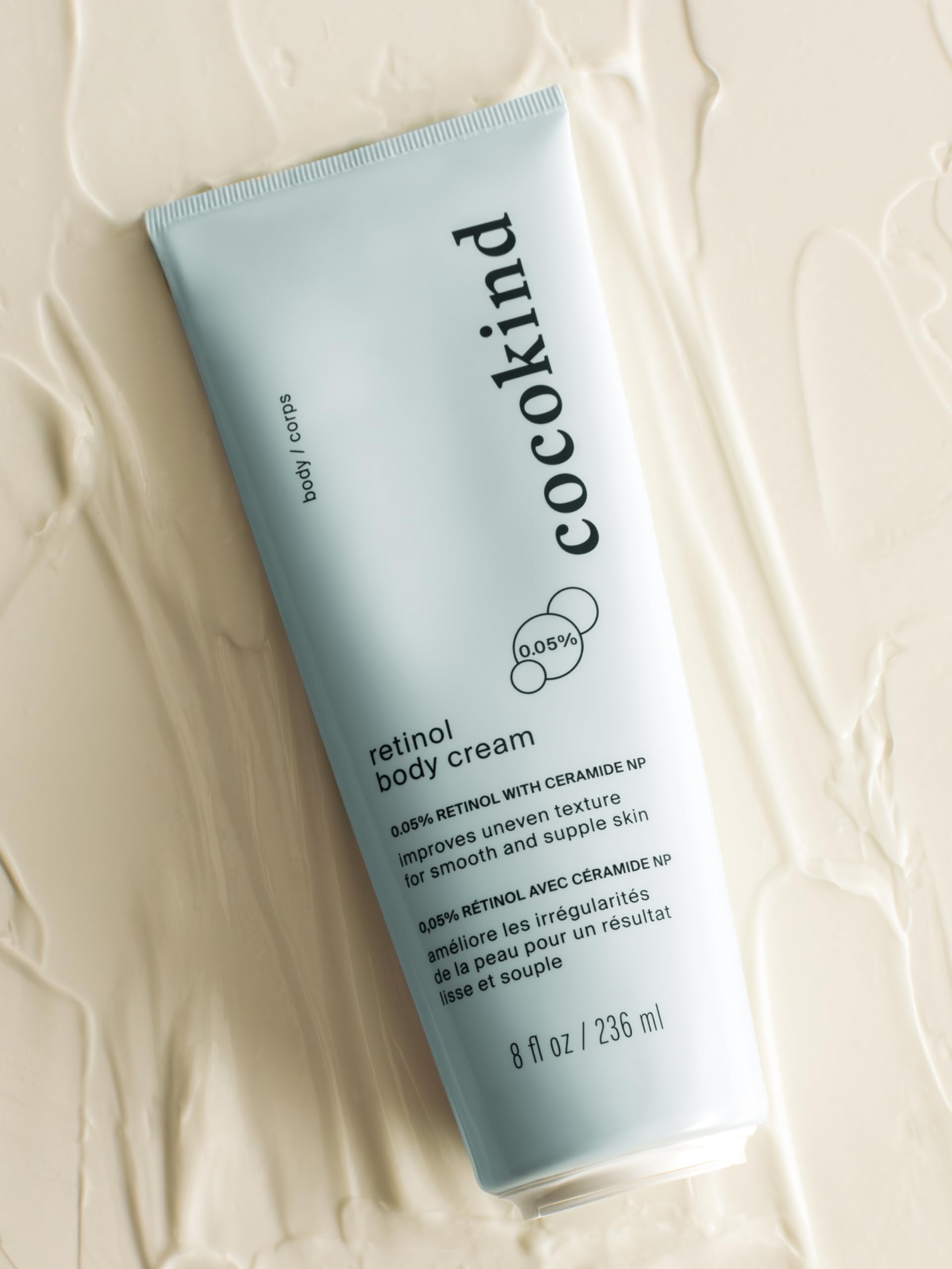 Cocokind product on nighttime bathroom counter implying evening routine convenience