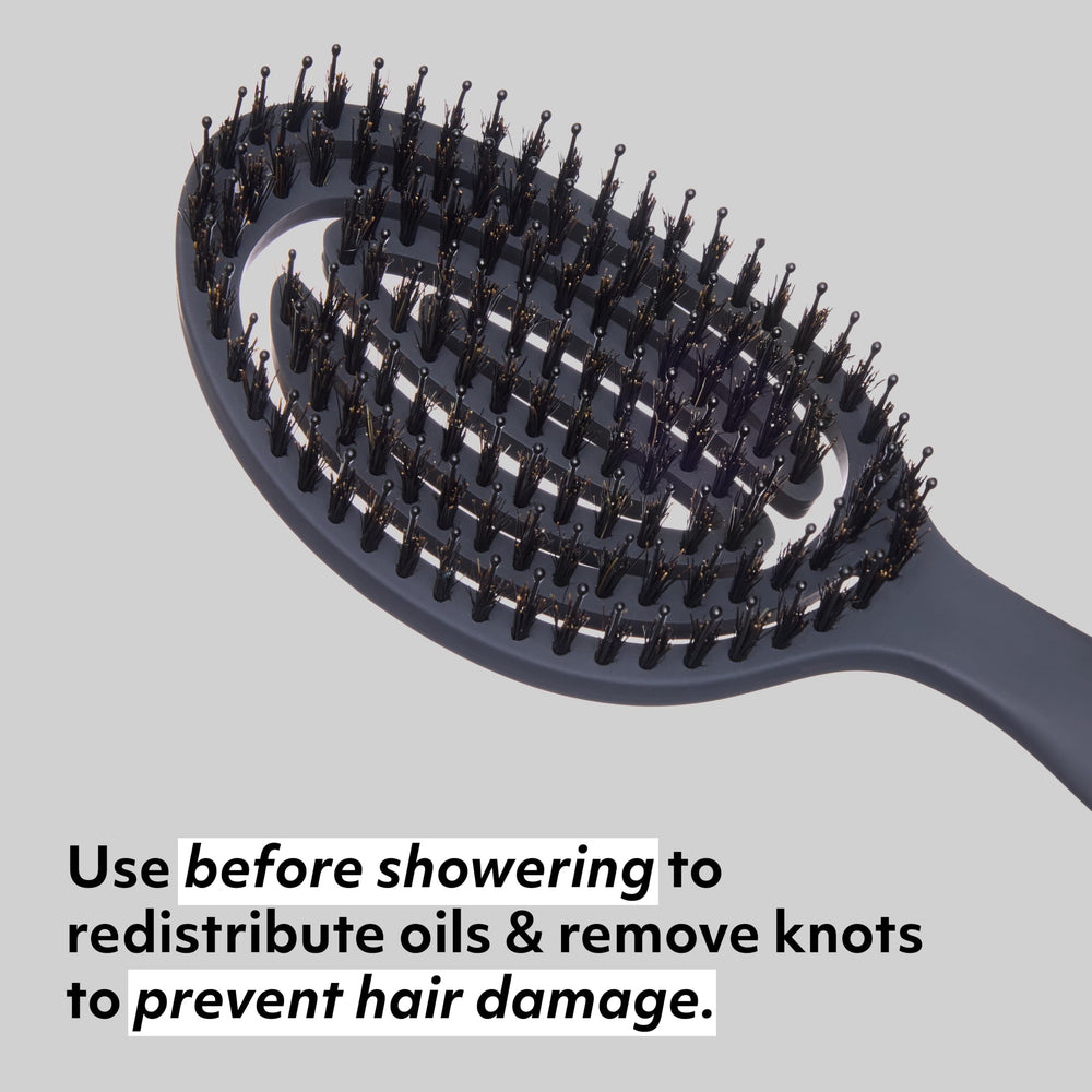 cocomintbeauty person using brush to smooth hair for shinier, less frizzy finish