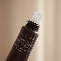 Colleen Rothschild lip balm open tube showing silky texture and easy application