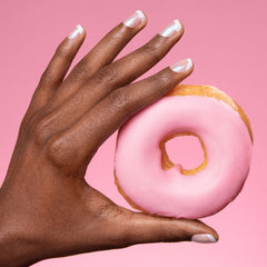 Color Street manicured hand in lifestyle scene showing polished confidence benefit