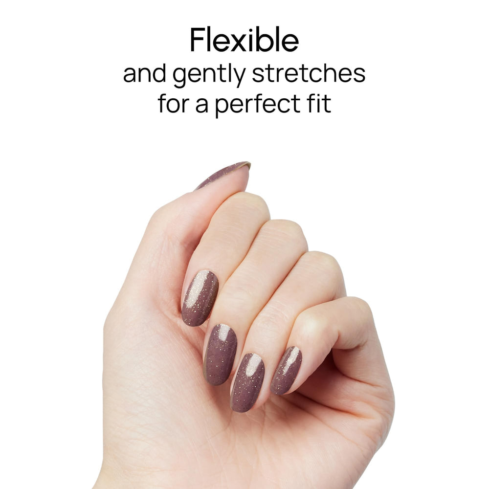 Finished Silk Scarf manicure on hands showcasing subtle gold shimmer