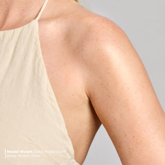 Colorescience applied on arm before and after showing even, radiant coverage