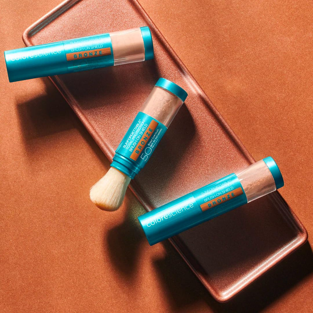 Colorescience brush-on shield Bronze powder texture swatch showing blendable finish