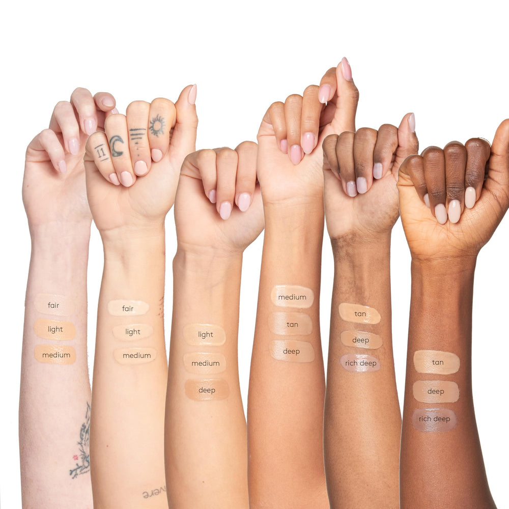 Colorescience held in hands to show actual size and practical portability