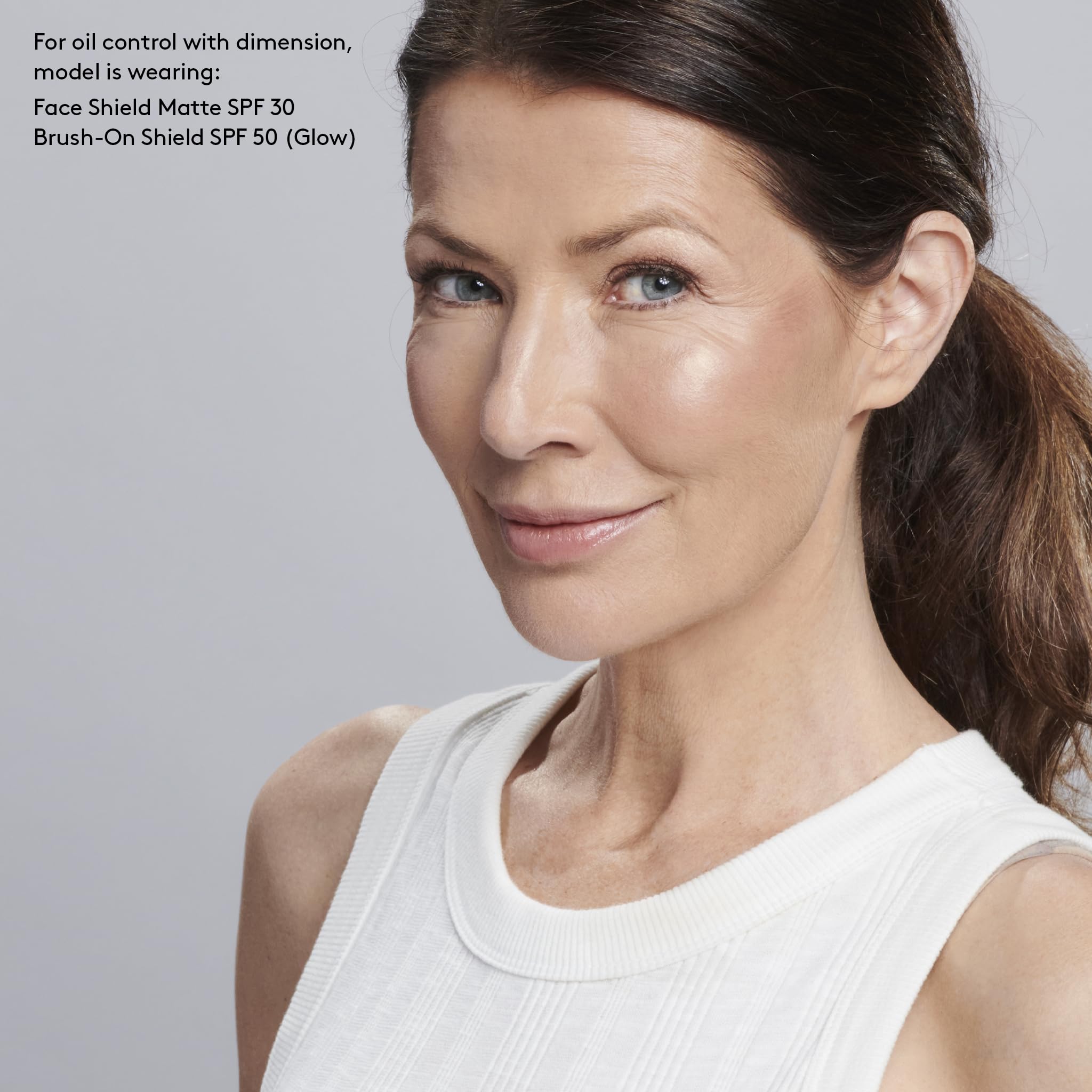 Colorescience Face Shield spreading on neck and décolleté, full-area protection benefit