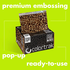 Colortrak foil folded around hair section, showing secure hold during processing