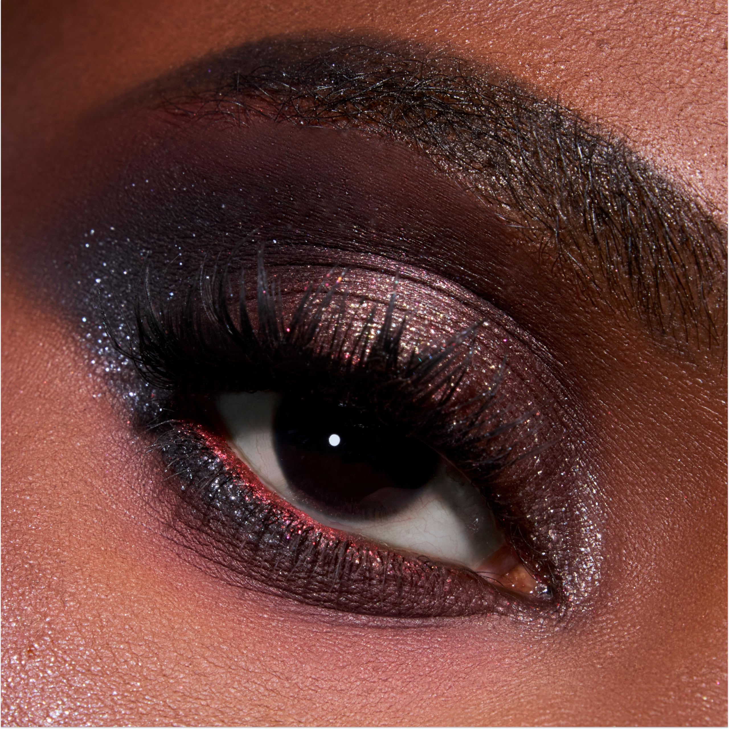 ColourPop brush applying metallic shade demonstrating easy pickup and smooth finish