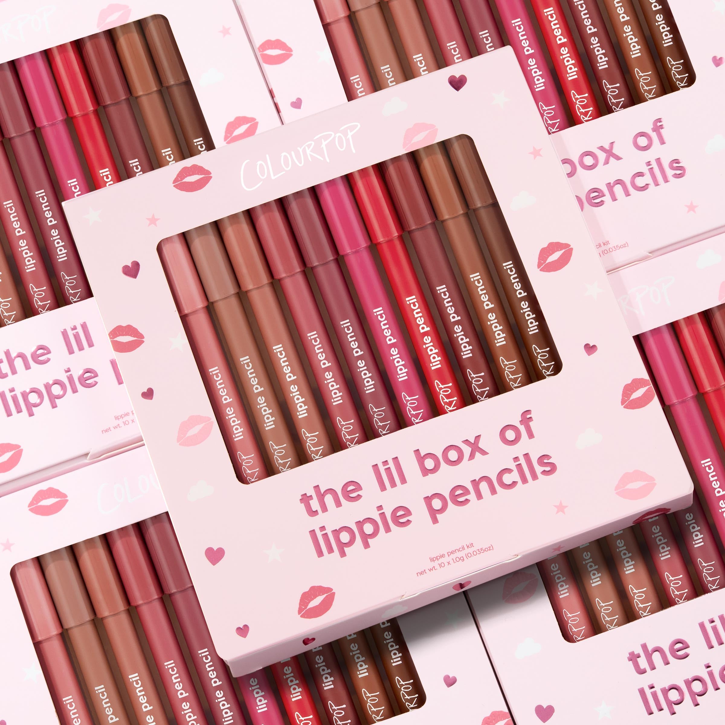 ColourPop lifestyle flatlay with pencils and accessories highlighting gifting appeal