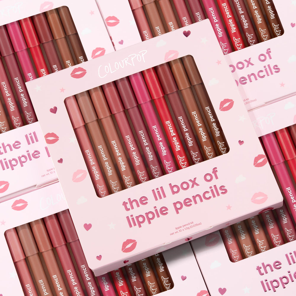 ColourPop lifestyle flatlay with pencils and accessories highlighting gifting appeal