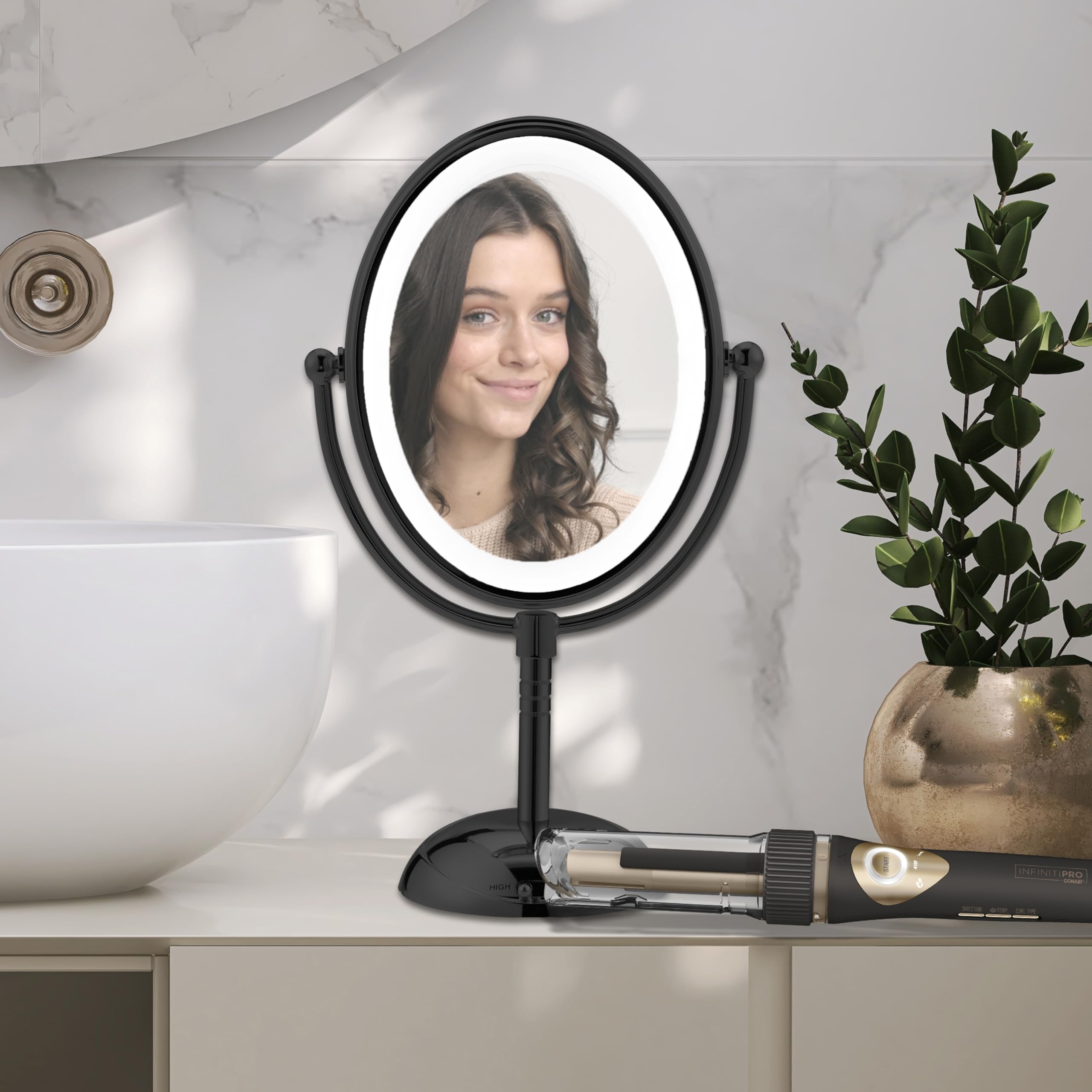 Conair bundle on vanity showing curling iron and mirror for streamlined routine