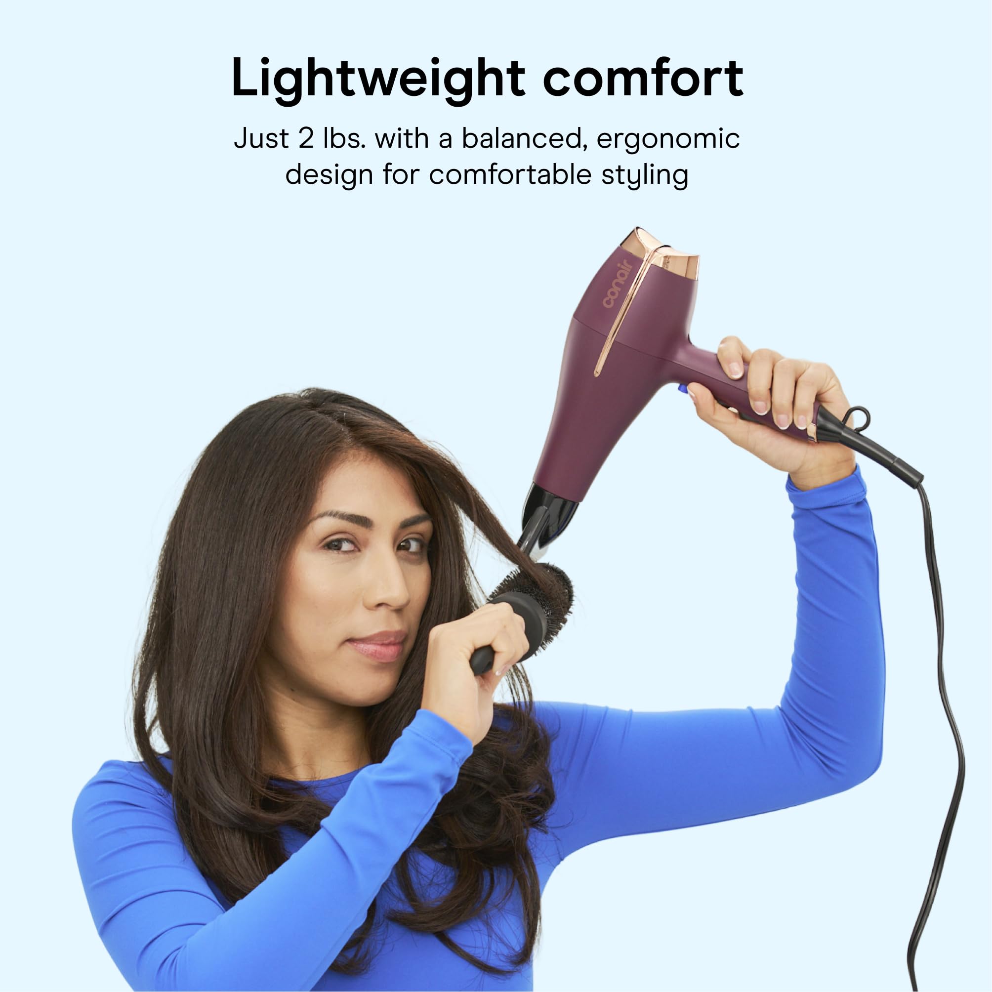 Conair in use with diffuser creating defined, frizz-reduced curls