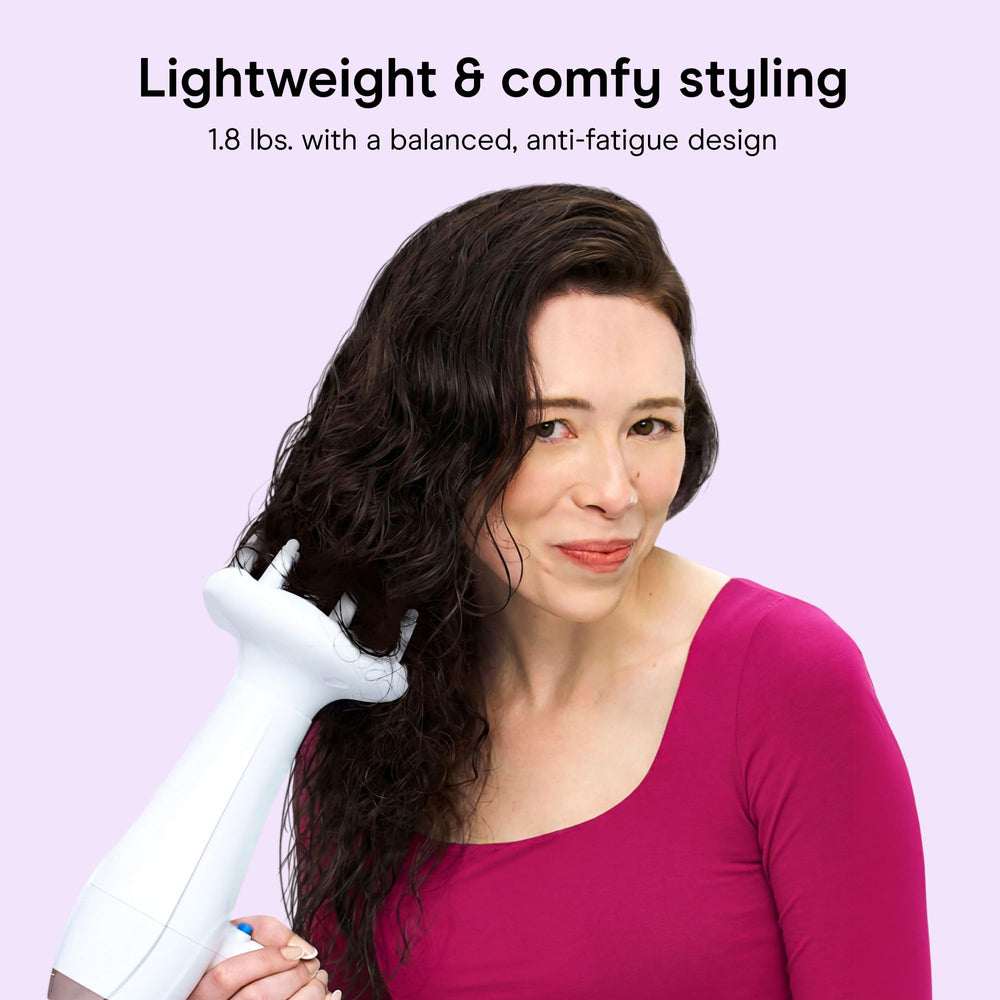 Conair handle controls showing heat and speed buttons for precise styling