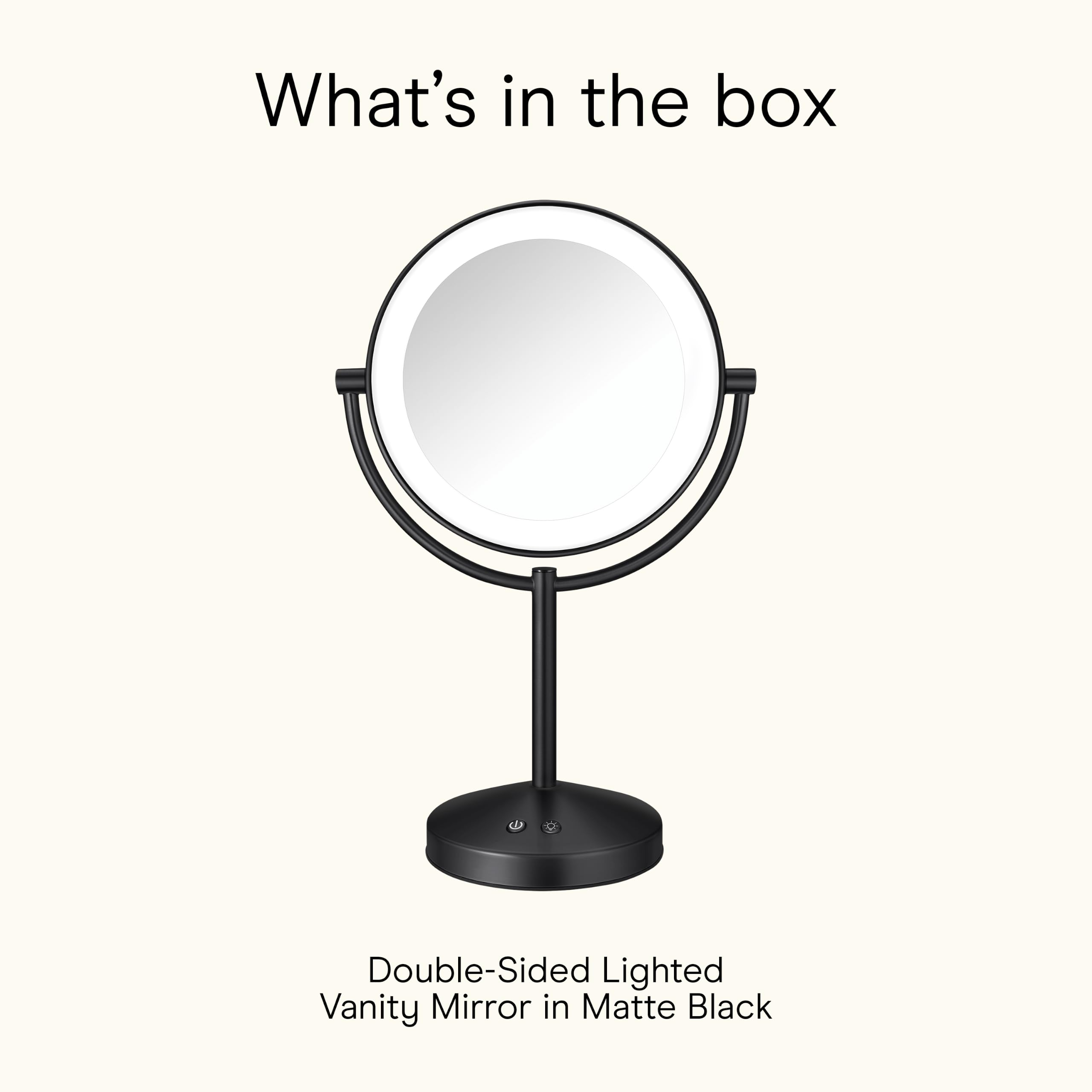 Conair mirror with hand for scale showing compact size and easy tabletop placement