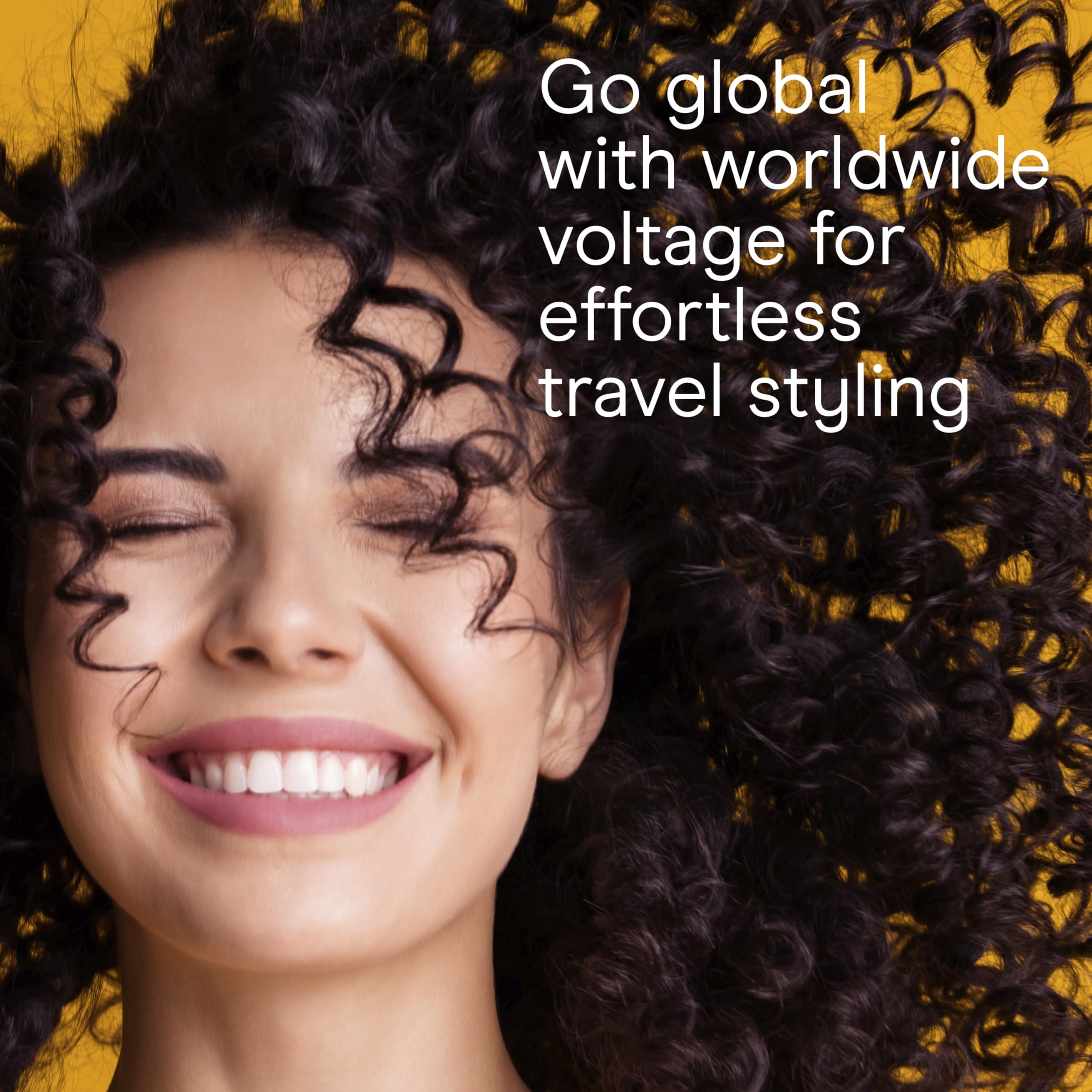 Conair curling iron held in hand to show compact size and easy travel benefit