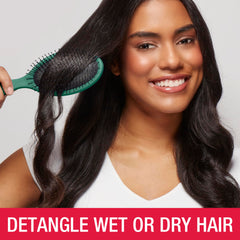 Conair tartan in-use on wet hair demonstrating gentle glide and quick knot removal