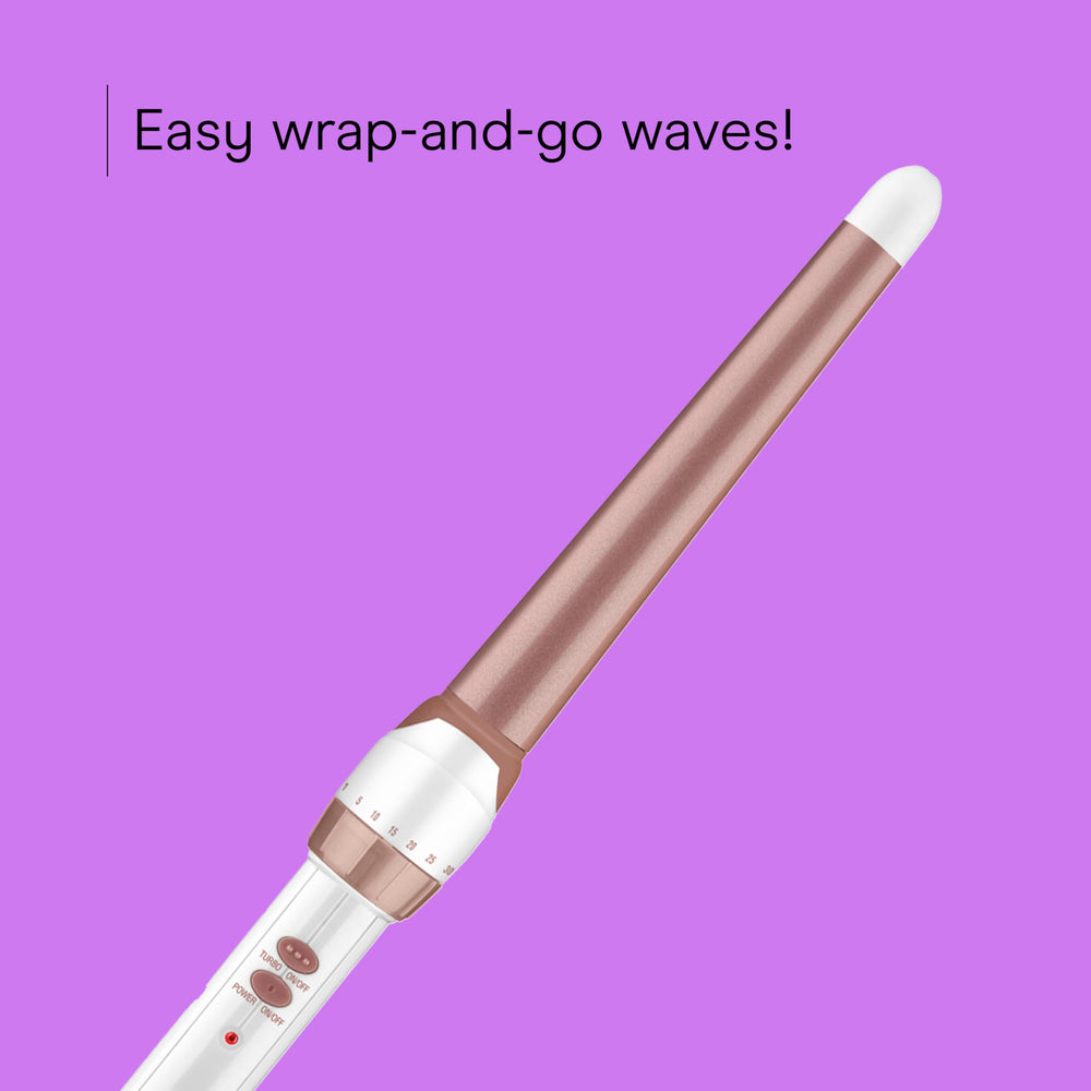 Conair wand in hand demonstrating clamp-free wrapping for effortless styling