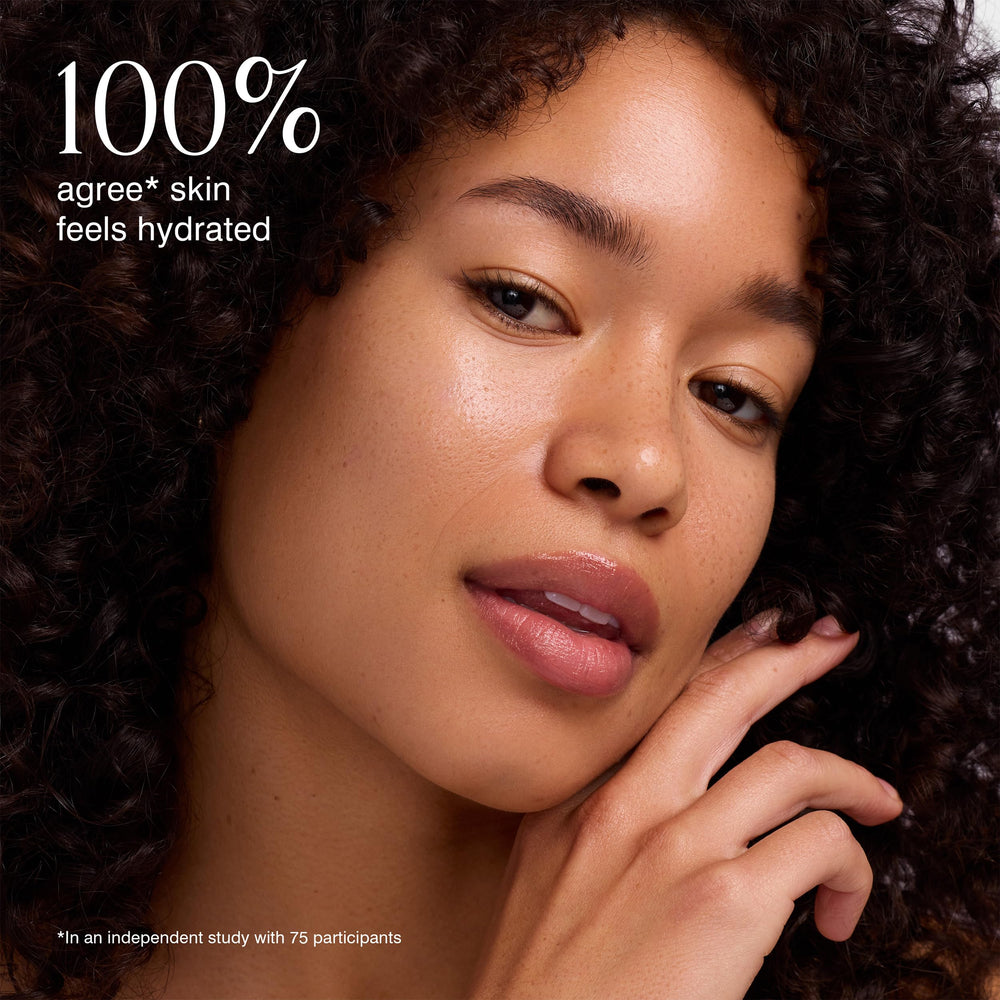 COOLA application on face showing even spread for under-makeup protection benefit