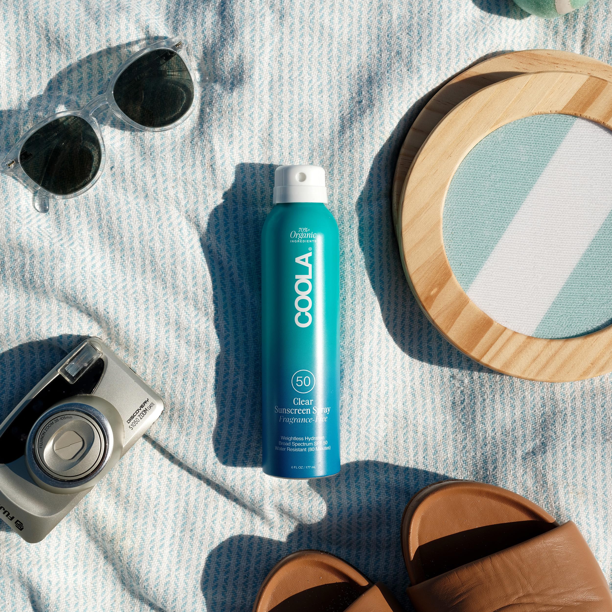 COOLA close-up of spray nozzle highlighting easy, targeted application