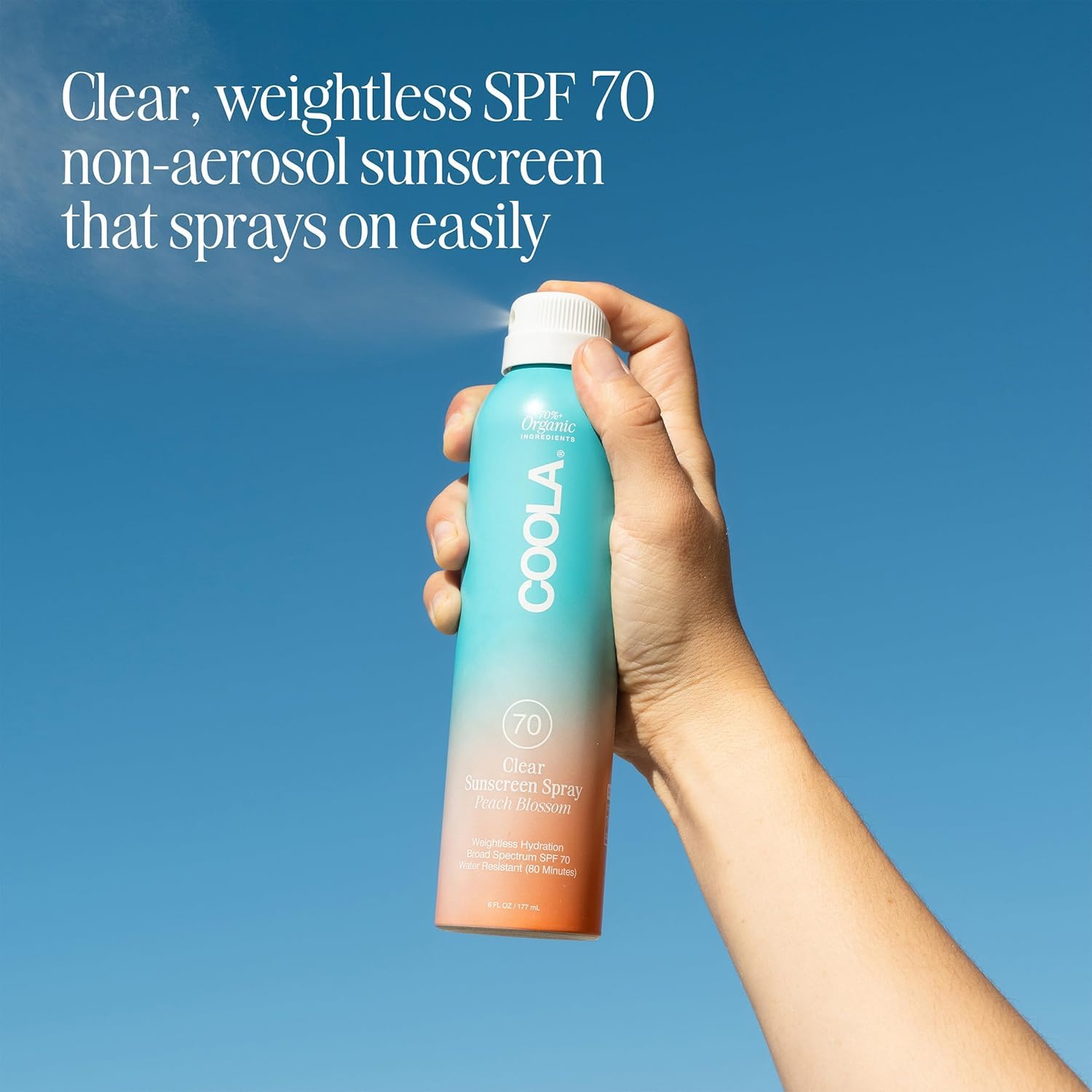 COOLA nozzle closeup demonstrating spray delivery and fast application