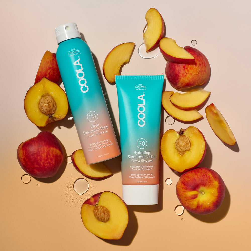 COOLA 6 fl oz bottle beside common items to show portable size benefit