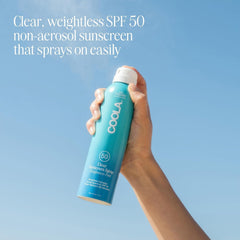 COOLA spray action dispersing clear sunscreen for quick, even sun protection