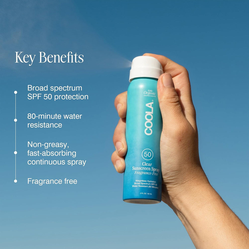 COOLA spray on skin demonstrating clear, fast-absorbing texture