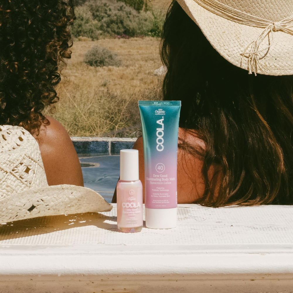 COOLA bottle beside common items to show travel-size convenience benefit
