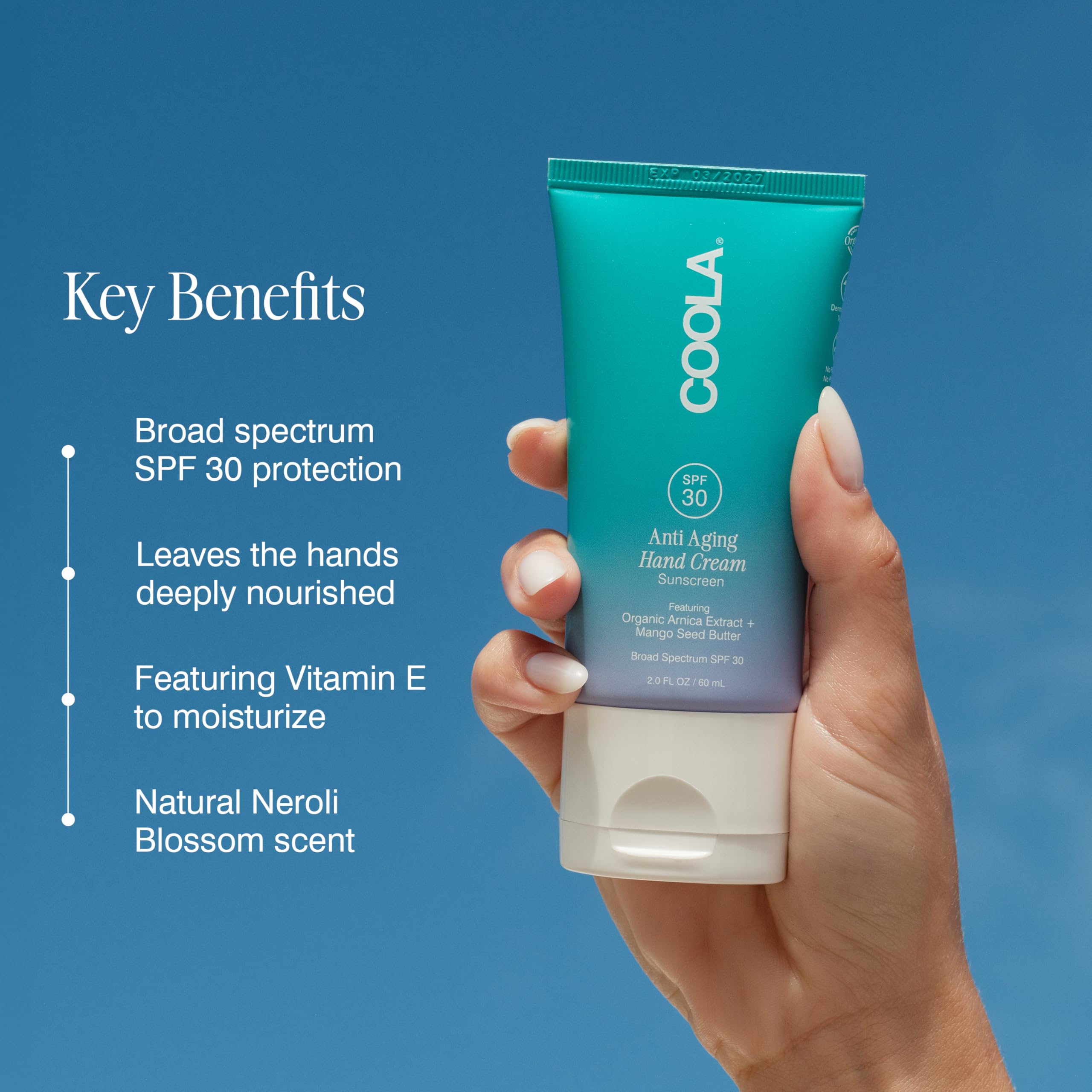 COOLA 2 fl oz tube beside credit card showing travel-friendly size