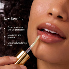 COOLA application on lips demonstrating shine and plumping look