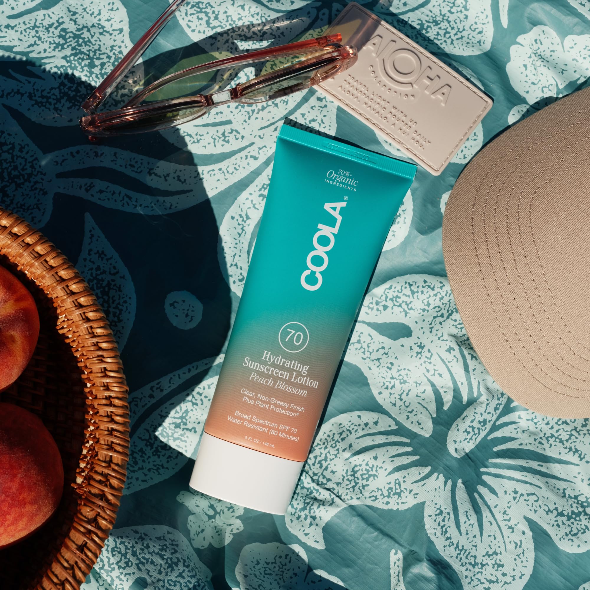 COOLA in use at the beach illustrating high protection during activity