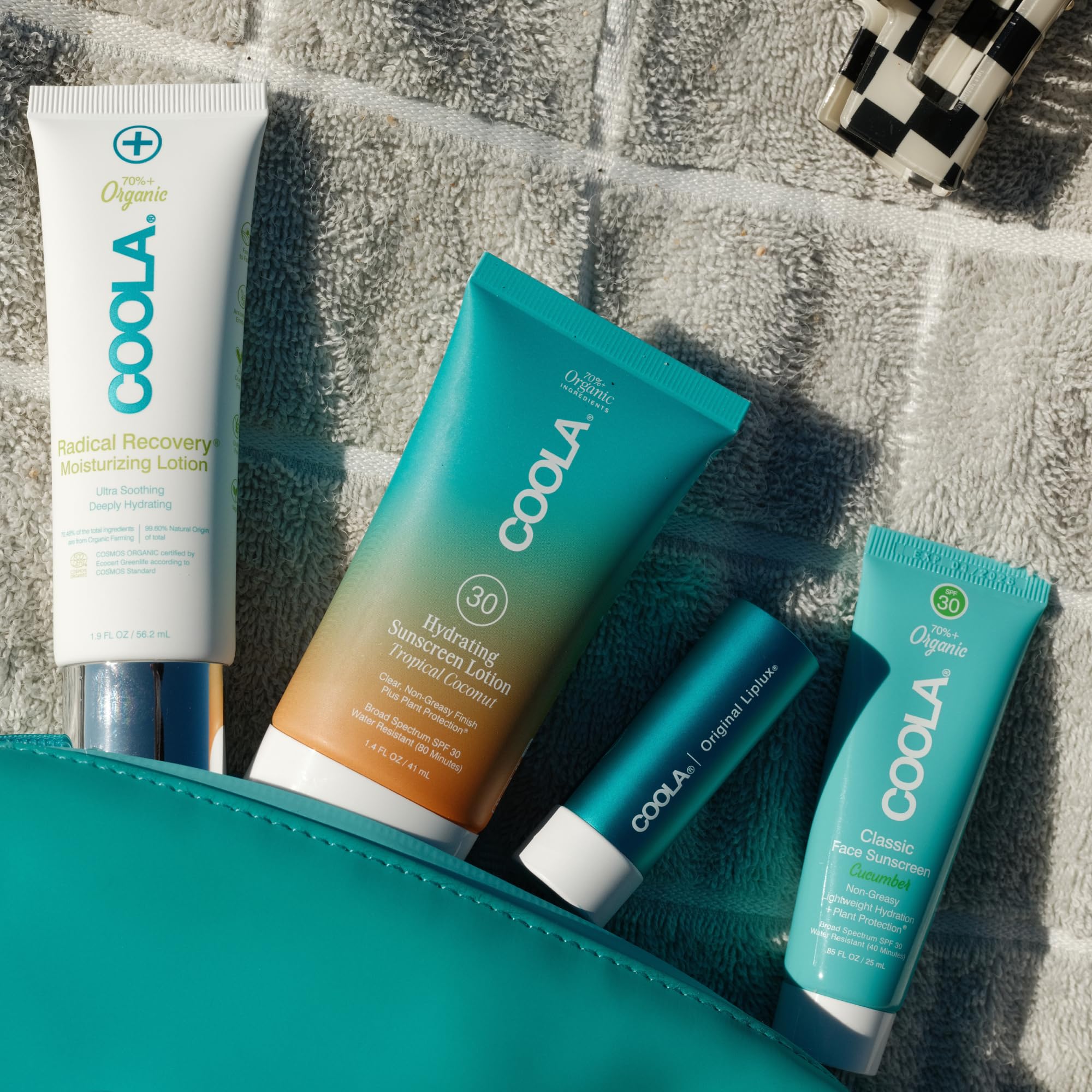 COOLA Radical Recovery after sun bottle poured to show soothing hydration