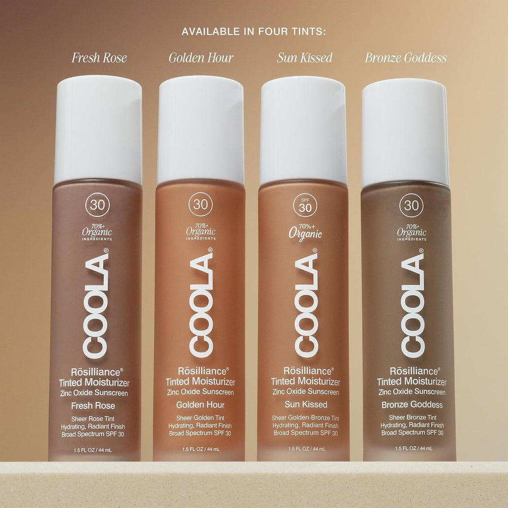 COOLA label close-up showing rose stem cells and blue light tech