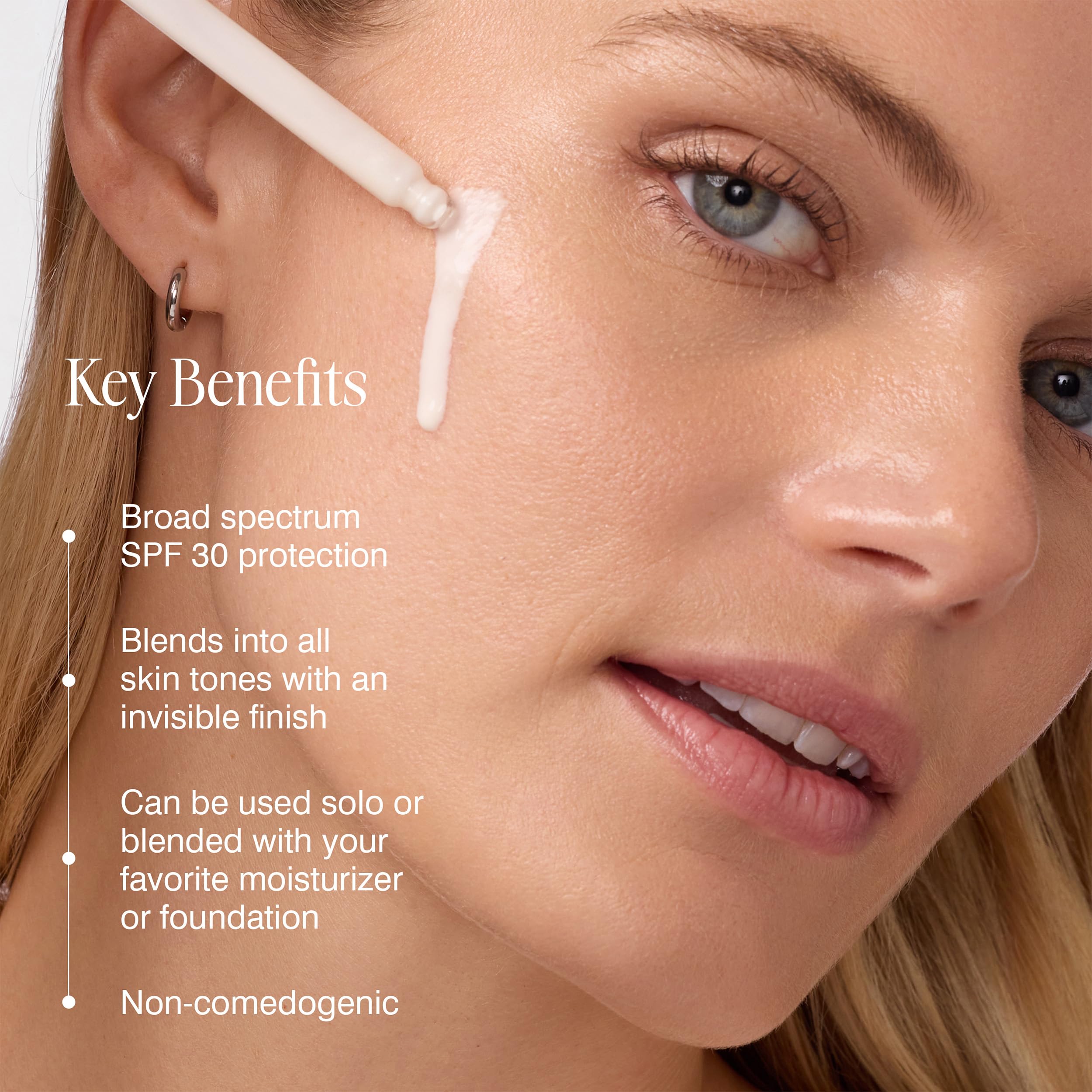 COOLA drops blended into moisturizer demonstrating easy mixing and invisible finish