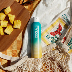 COOLA sunscreen texture on skin close-up showing sheer, non-greasy finish