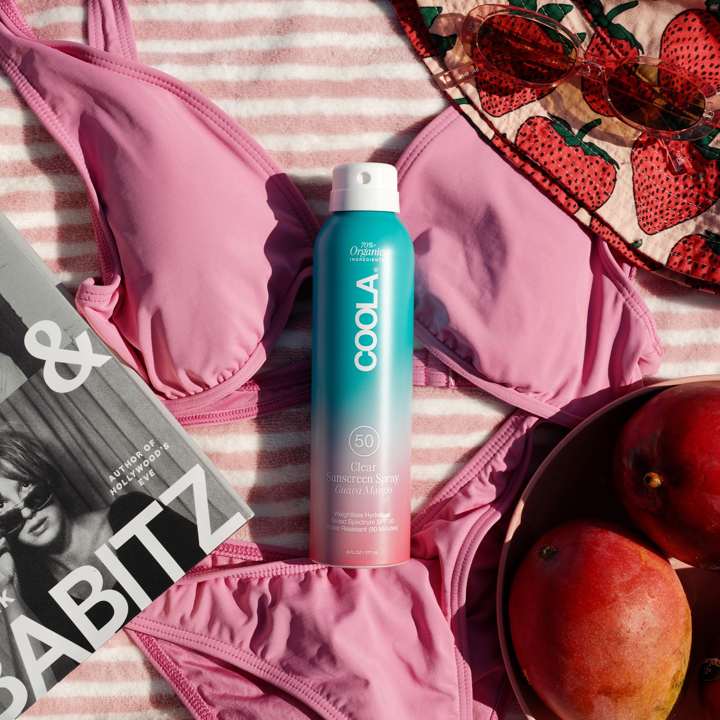 COOLA mist texture captured midair showcasing lightweight, non‑greasy feel