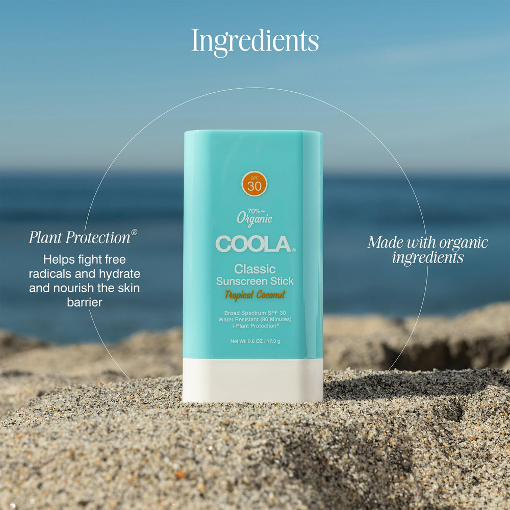 COOLA sunscreen stick applied at beach demonstrating water-resistant protection benefit