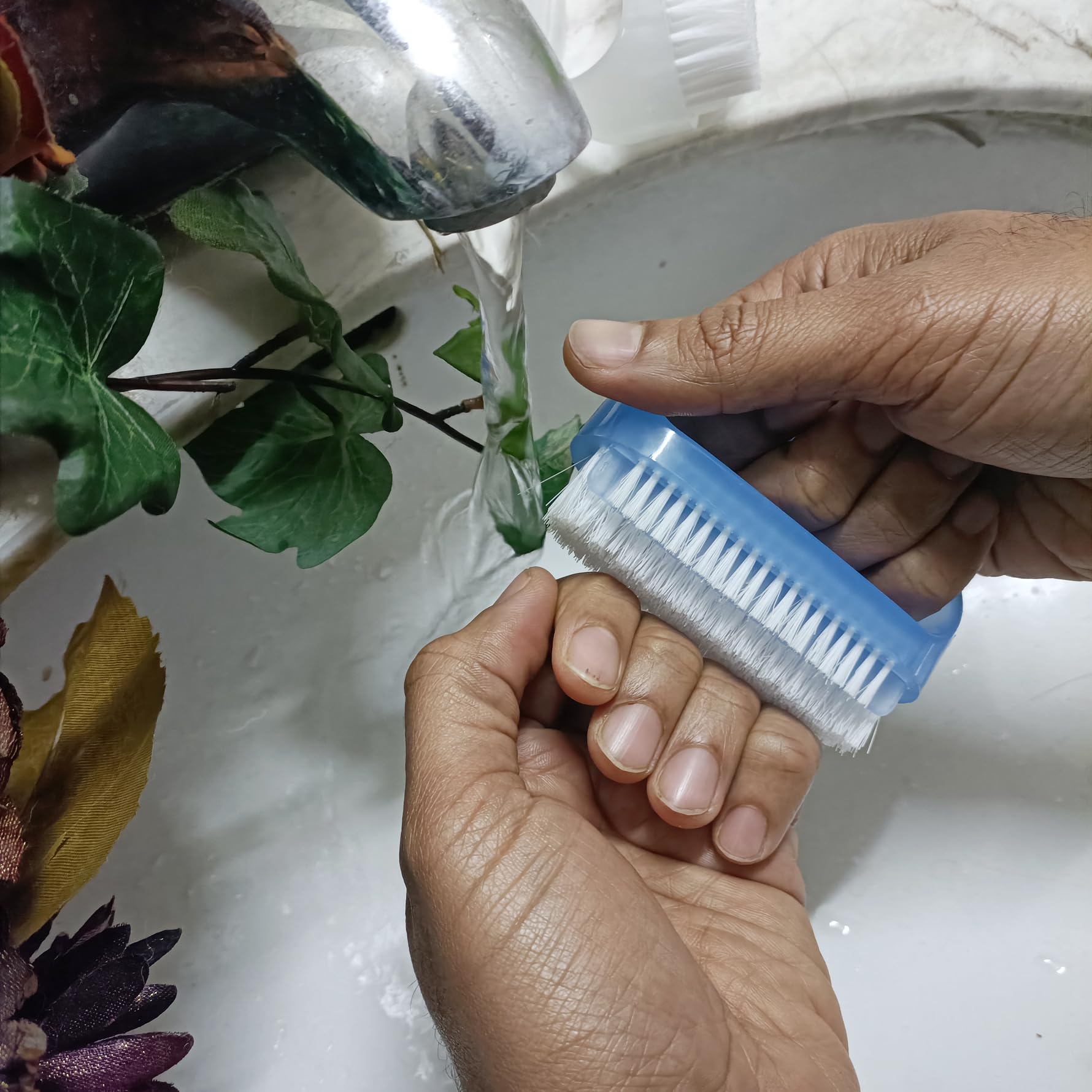Coralpearl brush held in hand demonstrating easy maneuverability