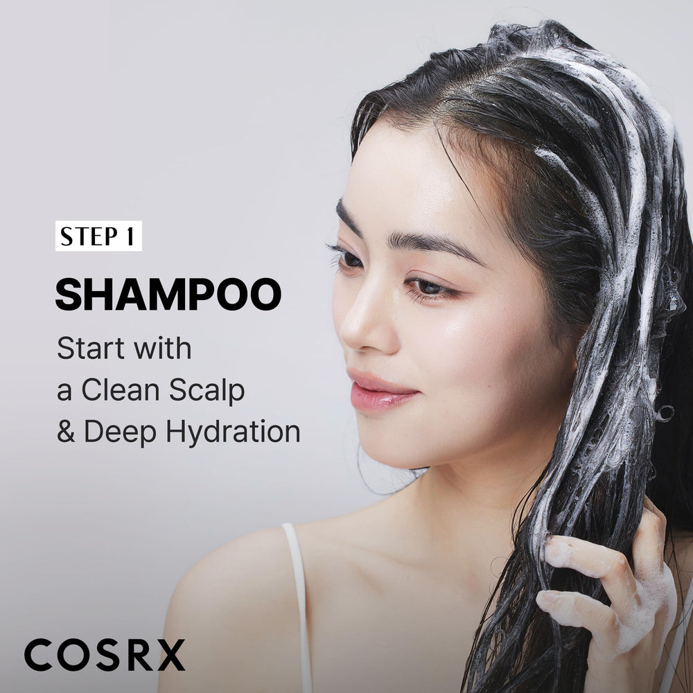 COSRX products in hand showing travel-friendly sizes for on-the-go hair repair
