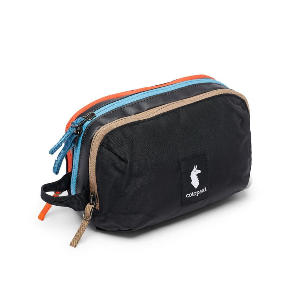 Cotopaxi Nido accessory bag front view showing compact black design and carry handle