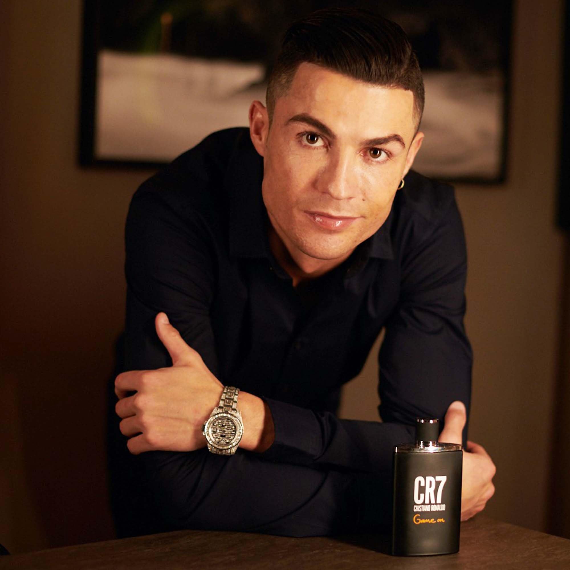 CRISTIANO RONALDO close-up cap and silver detail emphasizing premium finish