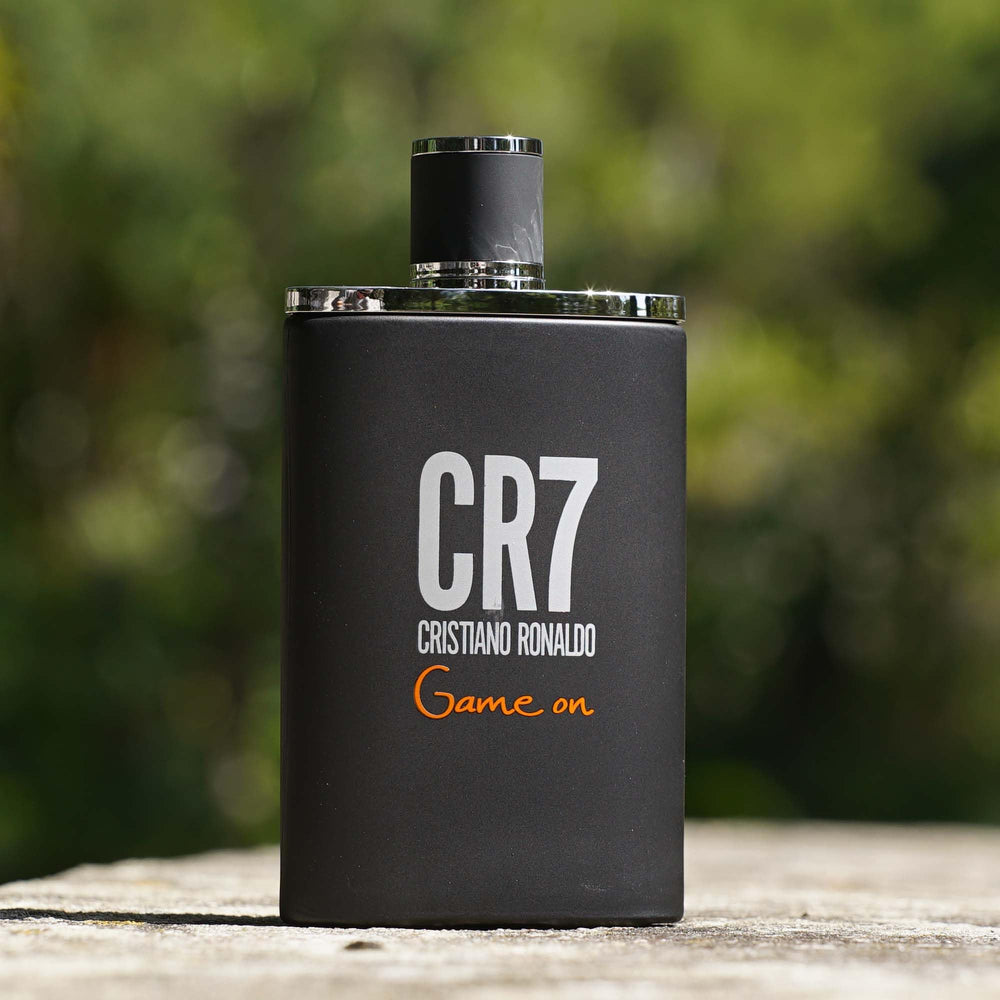 CRISTIANO RONALDO close texture of woody base notes showing premium material appeal